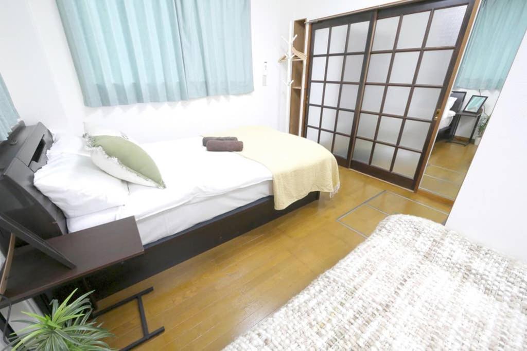 マスク配布ありa5 新宿10分 10人宿泊可能 出張在宅勤務に最適!!宿泊型テレワークスペース!!Wifi完備 回線安定してます!!長期宿泊受付中 Токио Экстерьер фото